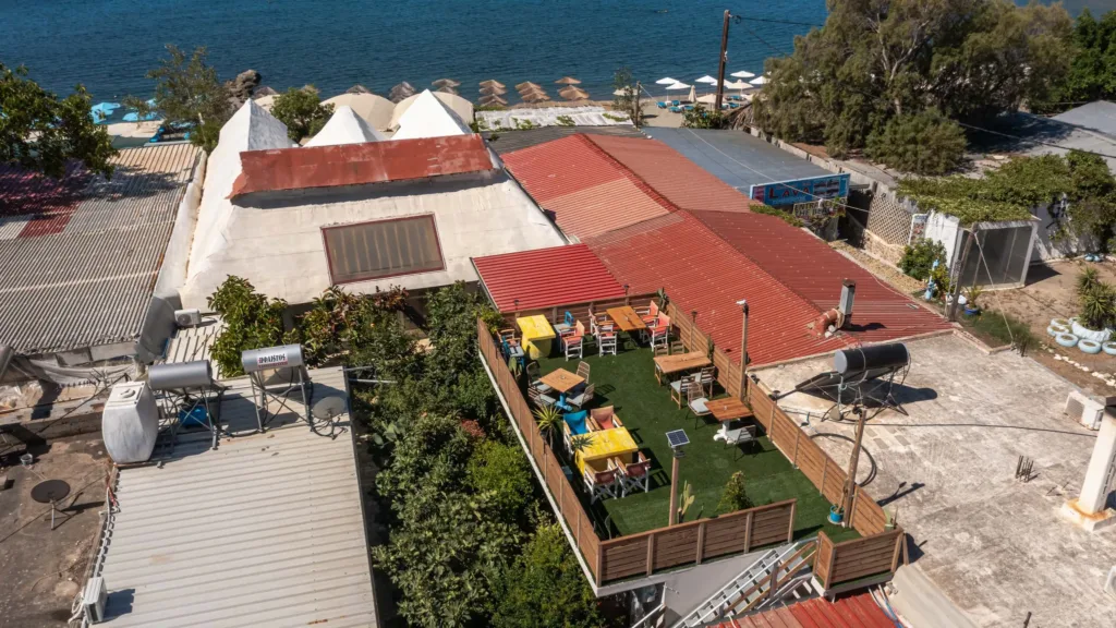 Aerial view of Lava Beach Suites beside Agia Galini beach